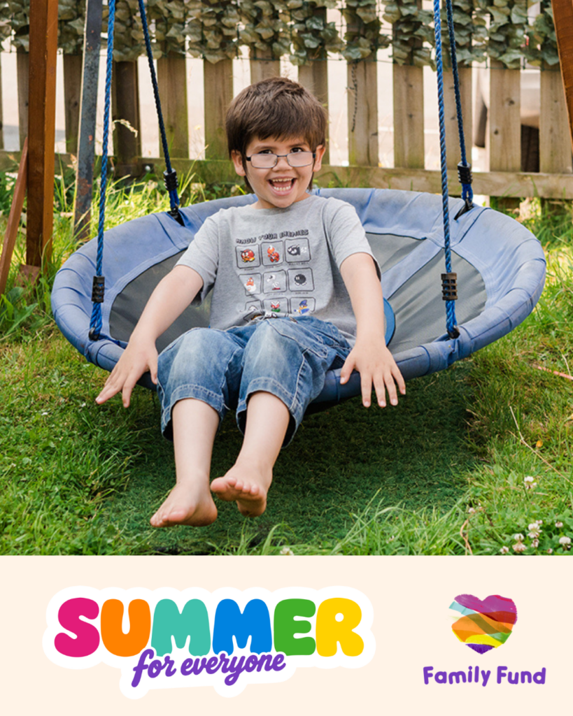 A young boy sits on a swing in his garden smiling at the camera. A banner at the bottom has two logos that say 'Summer for everyone' and 'Family Fund'
