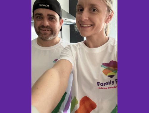 Photo of Michaela and Gary in Family Fund running t-shirts smiling at the camera
