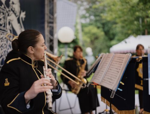a woman playing a flute