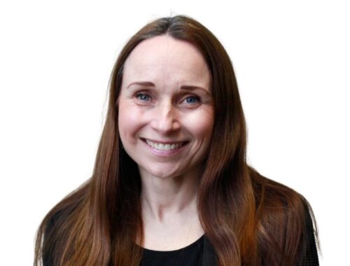 A woman with long brunette hair